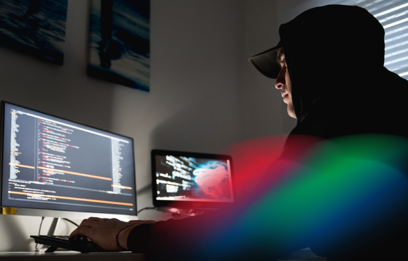 Hacker sitting at computer