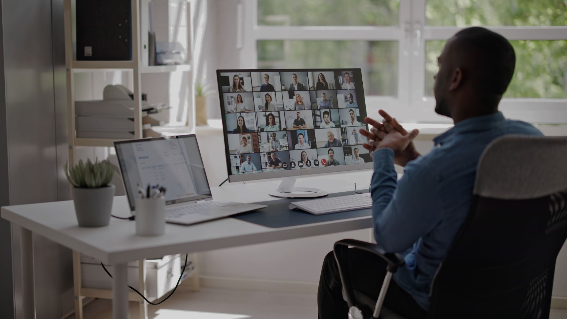 Man sitting at desk on Teams call